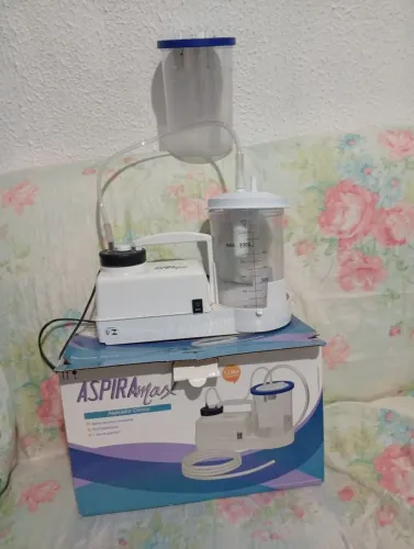 Aspirador de secreção pulmonar semi novo na caixa com manual 2 reservatório