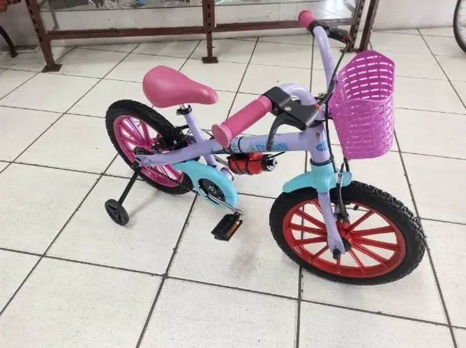 Bicicleta infantil 16" faixa 4/6 anos Bandeirantes Frozen meninas usada sem nenhum defeito