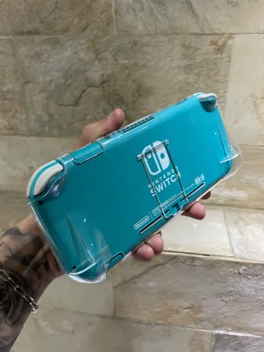 Nintendo Switch + JOGO SUPER SMASH BROS