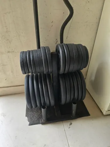 150kg de anilhas mais o suporte de anilhas