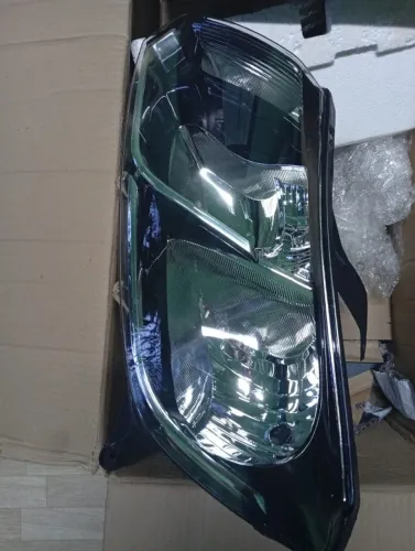Farol Esquerdo Sandero 