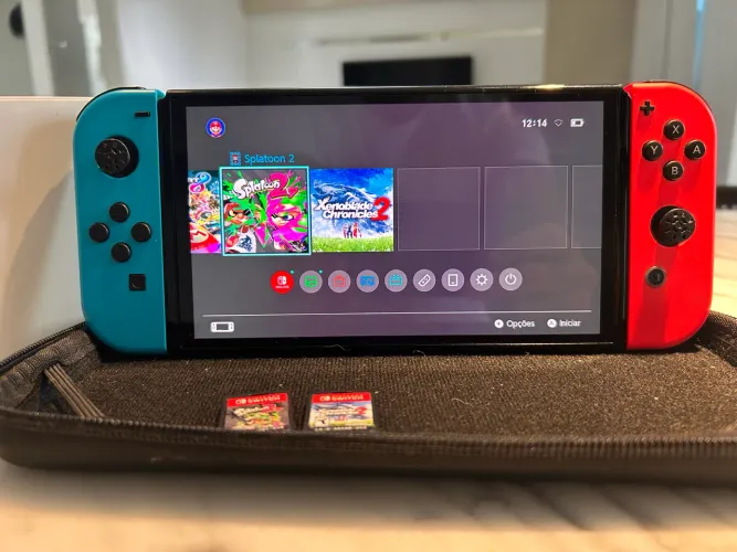 Nintendo Switch OLED 64GB + Dock + 2 Jogos + Case + Cabos