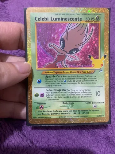 Carta rara edicao 30 anos pokemon celebi luminescente