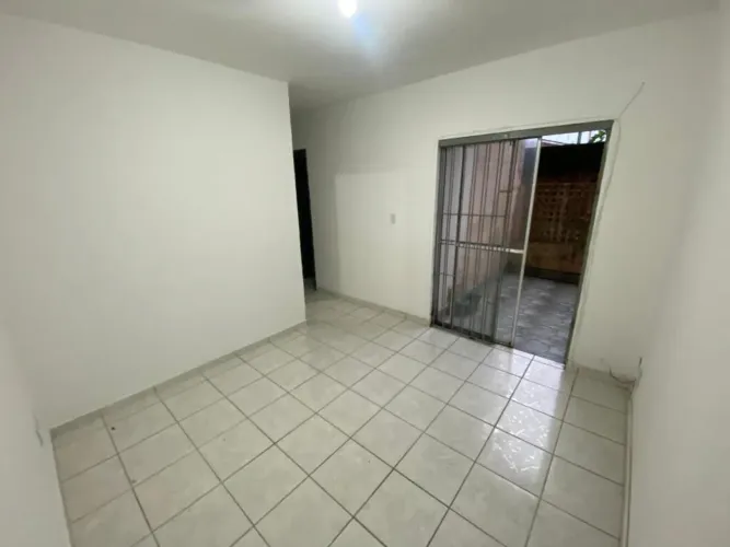 Apartamento 2 quartos 1 com quintal para locação - Jardim Princesa - Praia Grande - SP - A