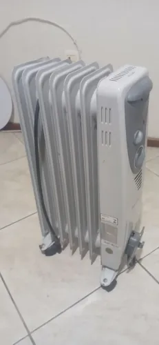 Aquecedor a óleo 127v.