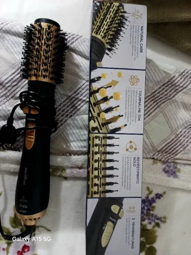 Escova de cabelo giratória