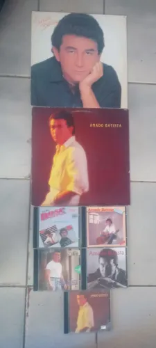 lote de 05 cd e 02 disco de vinil do Amado Batista .......originais .....