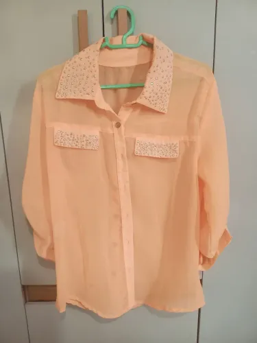 Vendo blusa manga longa , em ótimo estado 