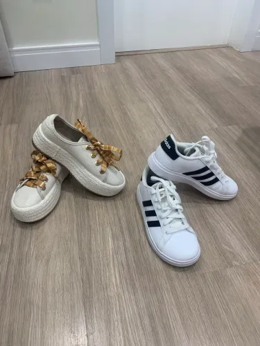 Dois tênis um adidas outro Beira Rio. 