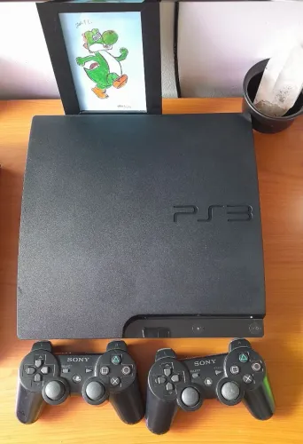 PS3 PLAYSTATION SLIM 160 GB + 2 CONTROLES ORIGINAIS + 25 JOGOS<br>