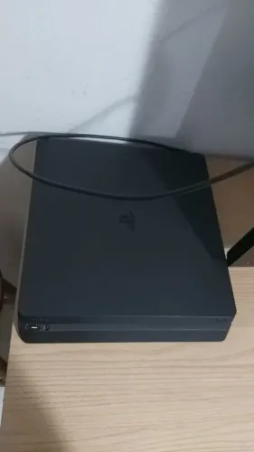 Ps4 slim, vai com todos os intens das fotos e cabos tanto de HDMI E controles