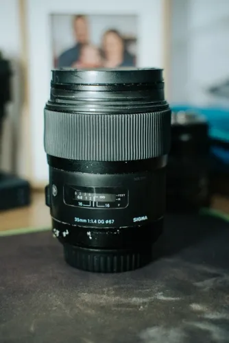Sigma 35mm f/1.4 DG HSM Art Canon EF - Manual + Adaptador Sony + Filtro UV