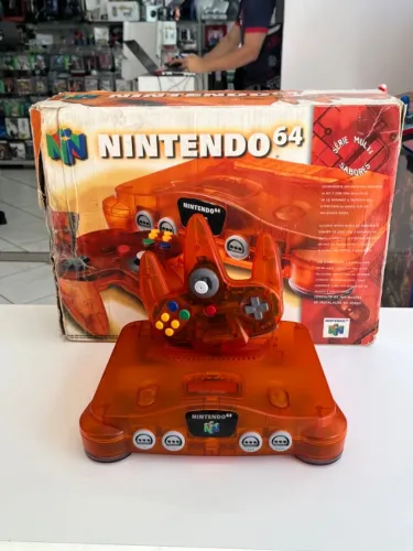 CONSOLE NINTENDO 64 SABORES TANGERINA NA CAIXA SEMINOVO - N64
