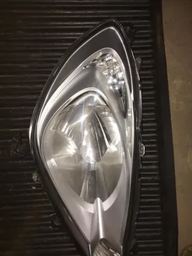 Honda fit ano 2014 farol lado direito