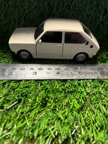 Miniatura FIAT 147 Bege - Coleção carros nacionais - Fricção