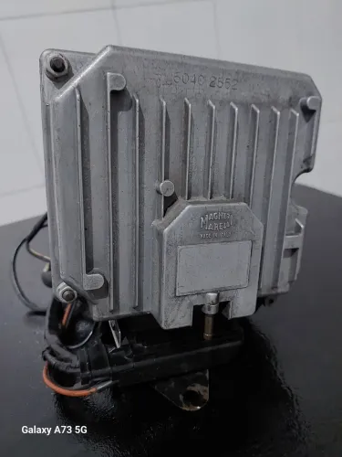 MÓDULO  DE INJEÇÃO  ,  COMPLETO  COM  SUPORTE  ,BOBINA  É  CHICOTE  DO UNO TURBO I.E  !