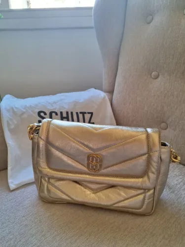 Bolsa Tiracolo Média Riviera Couro Dourada Schutz