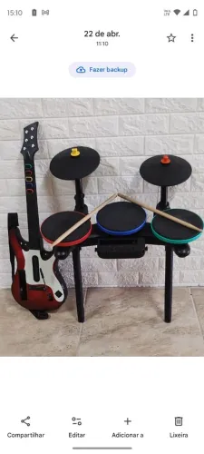 Guitar Hero, bateria e guitarra funcionando com a base da guitarra 