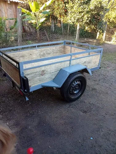 Carretinha mas caixa de som nova