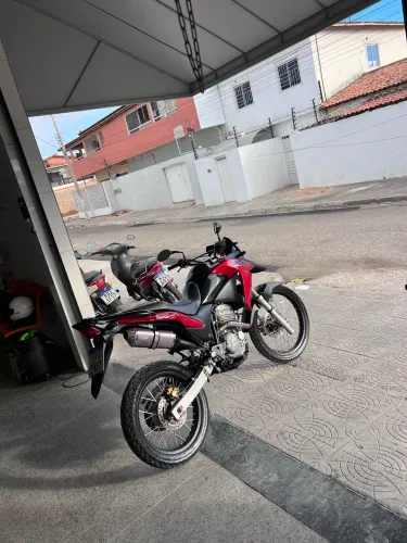 Vendo escapamento dore de xre estado de zero