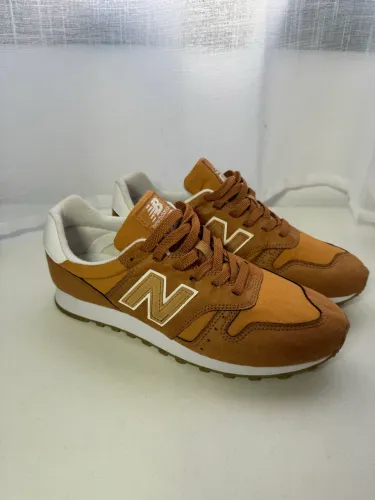 Tênis New Balance 373 caramelo br40 us8,5 novo