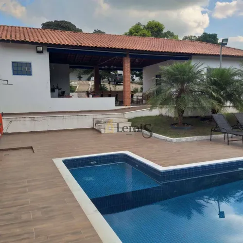 Chácara com 4 dormitórios à venda, 2000 m² por R$ 1.100.000,00 - Condomínio Chácaras Flóri