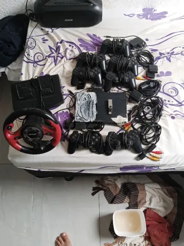 Playstation 2 usado com vários assessórios