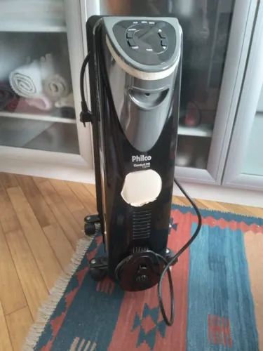 Aquecedor elétrico a óleo Philco ConfortPR 1500 Watts 110V medidas 54A x 36C x 15L cm
