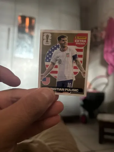 Figurinha panini de ouro do pulisic