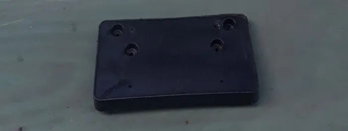 Suporte placa parachoque dianteiro camaro 
