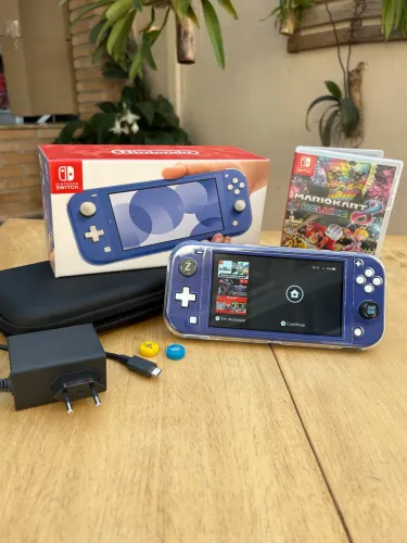 Nintendo switch lite + Mario Kart + acessórios 