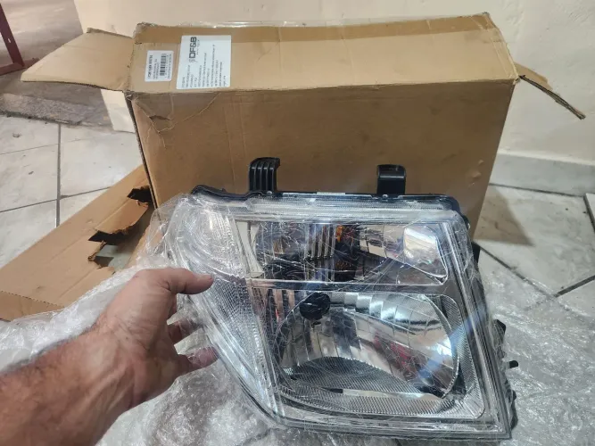 Farol direito (passageiro) nissan frontier 2008 a 2015 novo