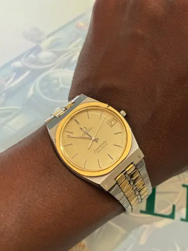 Omega aço aro ouro