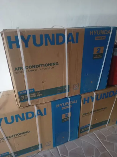 Ar condicionado quente e frio novo na caixa