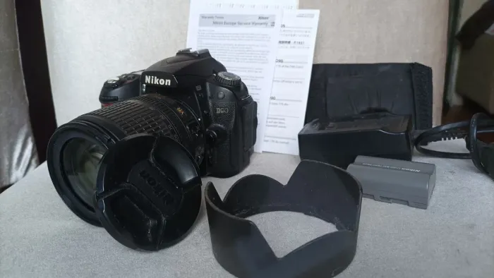 Máquina fotográficoa D90 Nikon.