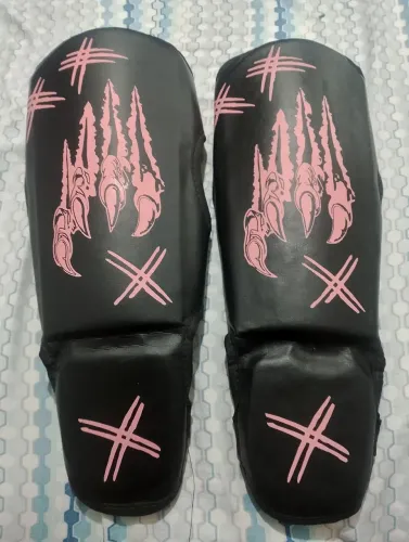 Caneleira de muay thai