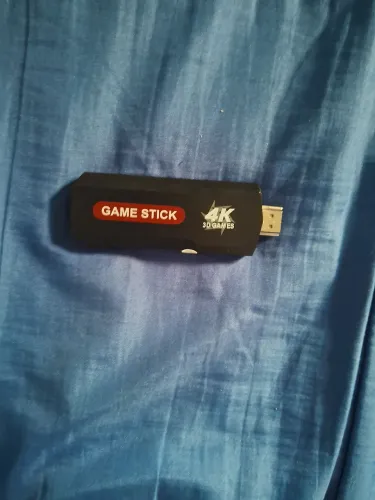 Vendo gamestick seminovo com 2 controles,adaptador,carregador e fio de conexão