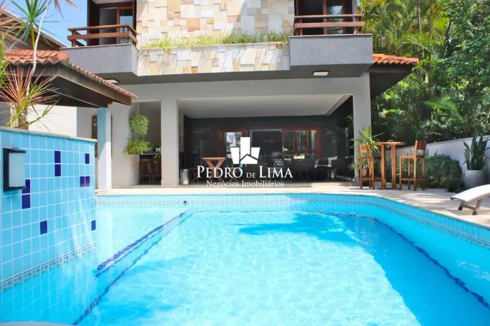 Casa com 6 dormitórios à venda, 336 m² por R$ 6.758.900,00 - Riviera Módulo 19 - Bertioga/