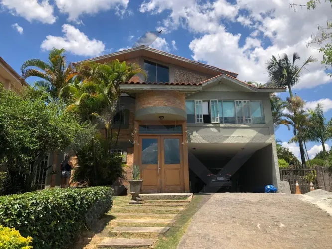 Casa com 4 dormitórios à venda, 590 m² por R$ 2.100.000,00 - Condomínio Refúgio dos Pinhei