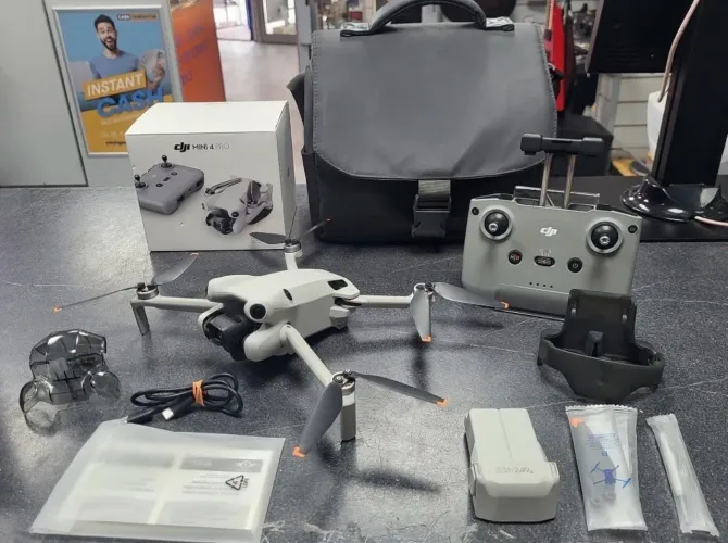 DJI Mini 4 Pro Camera Drone (with RC-151 Remote) -