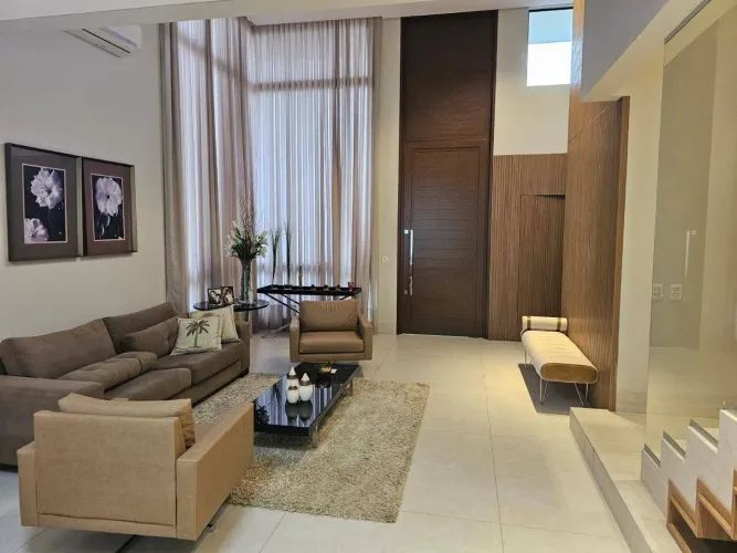 Casa de Luxo no Condomínio Florais dos Lagos: 4 suítes, piscina, energia solar e automação
