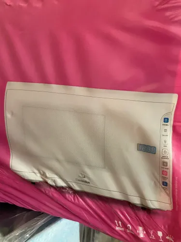 Vendo microondas 31 litros na caixa novo