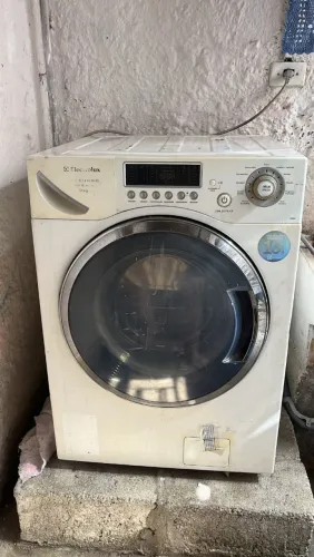 Máquina lava e seca com defeito