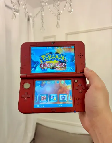 Nintendo New 3ds Xl com muitos jogos como Pokémon Mario e Zelda
