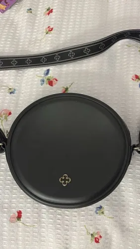 Bolsa redonda Capodarte preta com alça larga