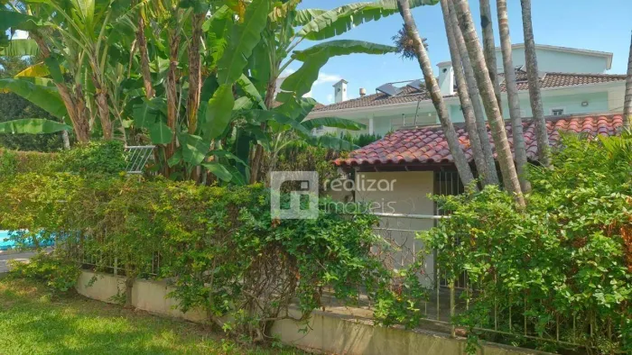 Casa com 4 dormitórios à venda, 180 m² por R$ 2.300.000,00 - Itacorubi - Florianópolis/SC