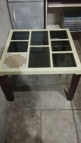 Mesa de centro de sala e um rack por 120
