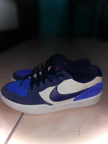 Sapato Nike e chuteira adidas 