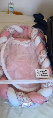Bebê conforto e um ninho