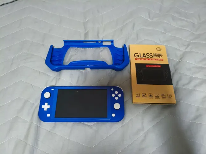 Nintendo switch lite+capinha+2 película+2 jogos